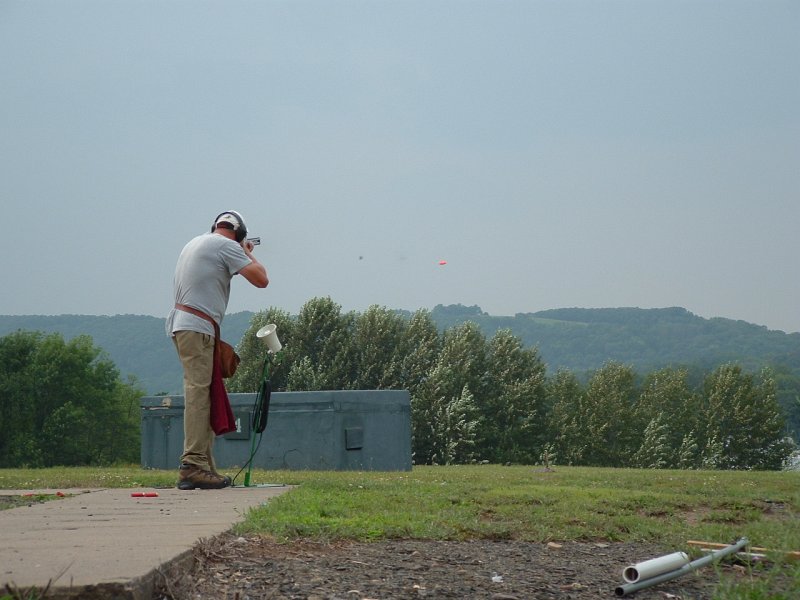 dscf0062l.jpg - PETER TSEMENTZIS from Ontario, during the first round of shoot off... see the wad and the shot pattern about to hit the target?