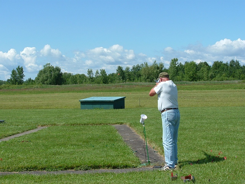 dscf0087j.jpg - My father, Gerry Ostrander, mid shot during today's handicap event. Dad's squad, Chris Vendel, Dad, some guy I don't know, Christopher Vendel and Stephanie Sandler, shot the caps on bank 3 today.
