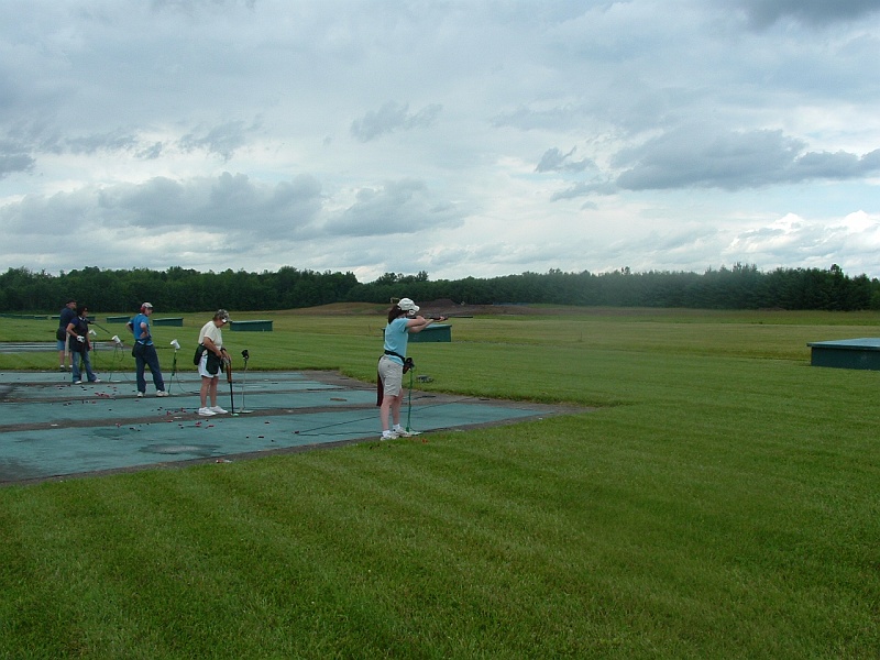 dscf0049m.jpg - Pete Hammond's (NYSATA Western Director) wife shooting in today's handicap event. She's shooting on bank 4A and this is looking back toward banks 4 through 12.